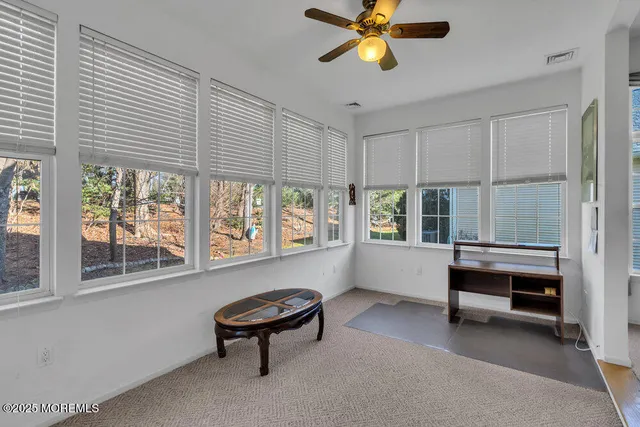 a kitchen with stainless steel appliances kitchen island granite countertop a sink and cabinets