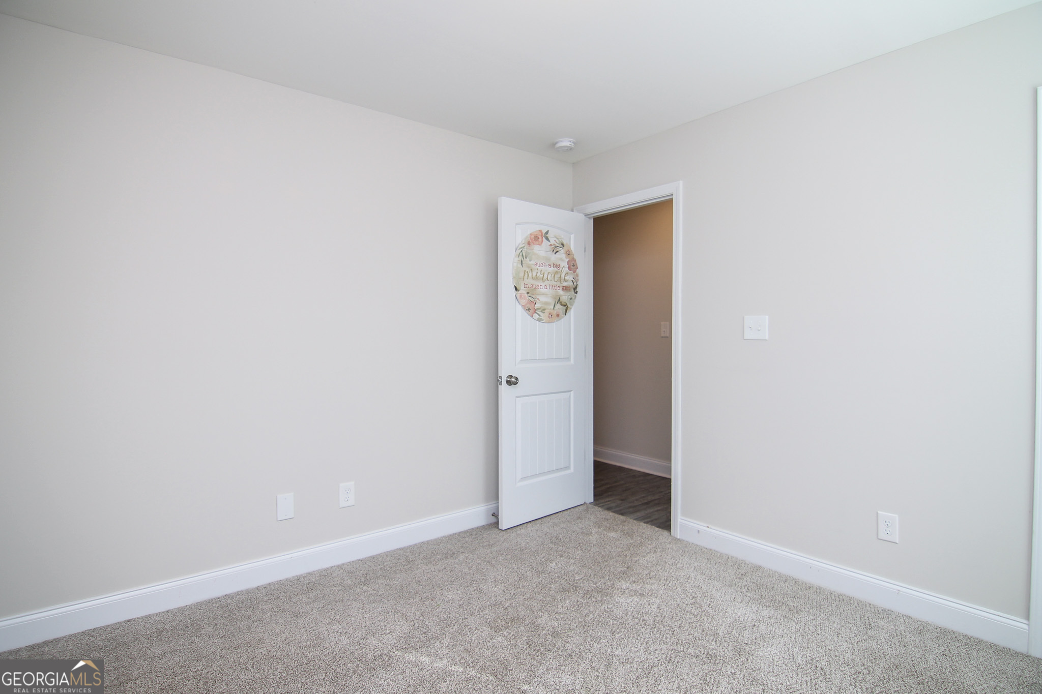 138 Sadie Heights Boulevard Perry, GA 31069 - Photo 29 of 31 a view of an empty room