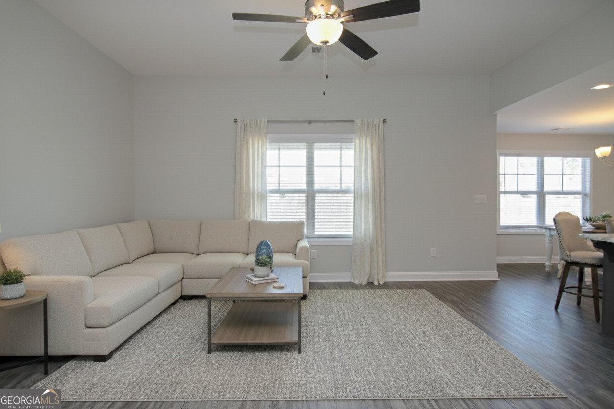 138 Sadie Heights Boulevard Perry, GA 31069 - Photo 3 of 31 a living room with furniture and a window
