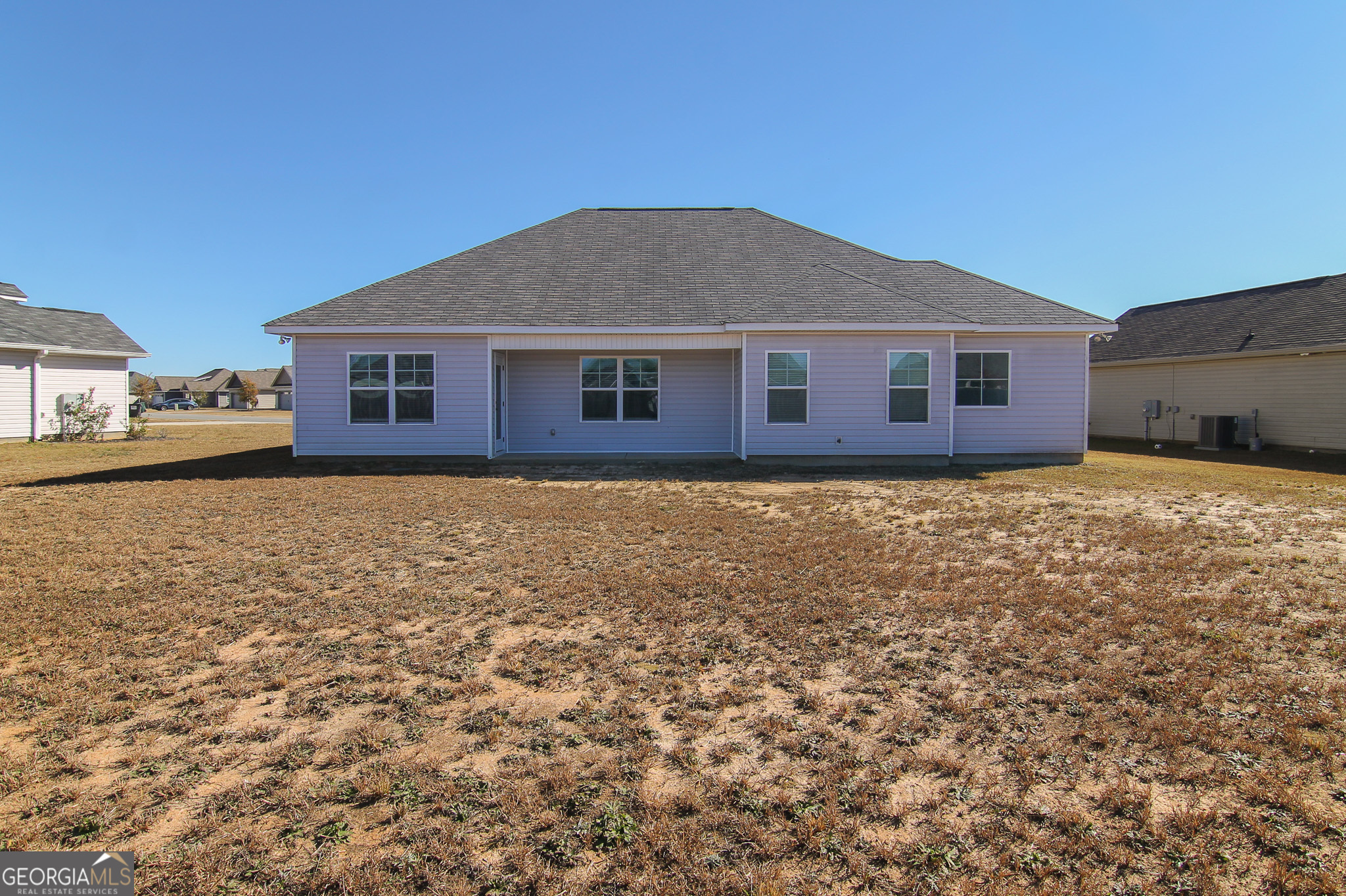 138 Sadie Heights Boulevard Perry, GA 31069 - Photo 31 of 31 front view of a house with a yard