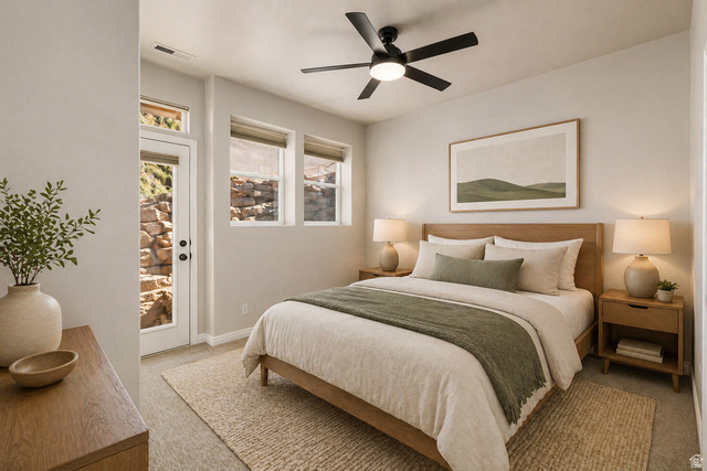 2158 Balboa Way St. George, UT 84770 - Photo 25 of 40 VIRTUALLU staged. Bedroom with access to outside, light carpet, ceiling fan, and multiple windows