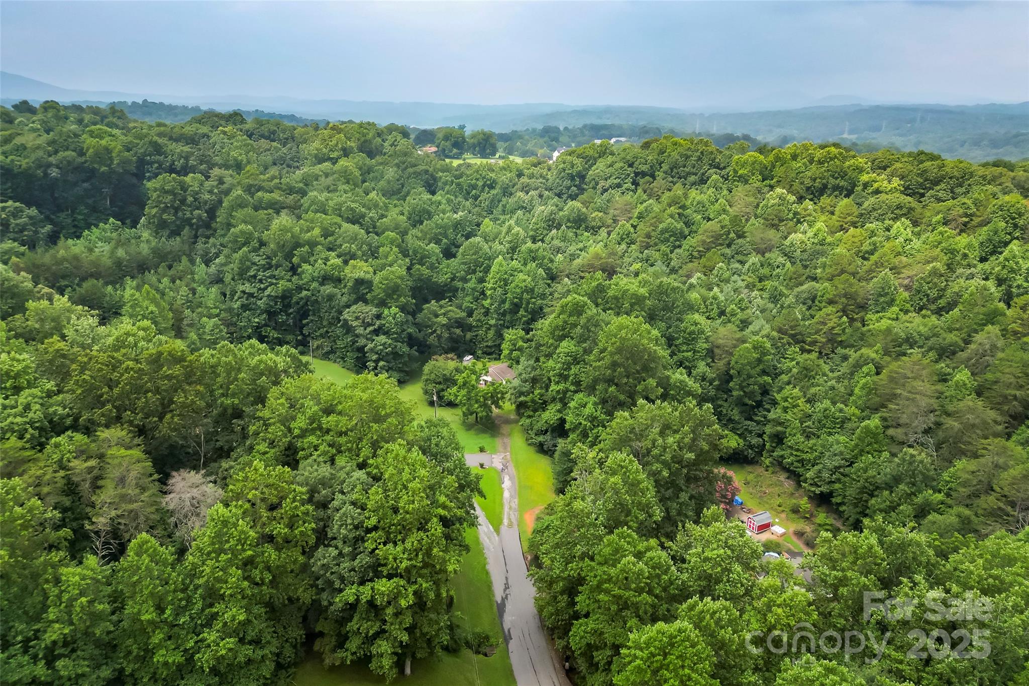5526 Harris Farm Road Hickory, NC 28602 - Photo 16 of 18 a view of a bunch of trees