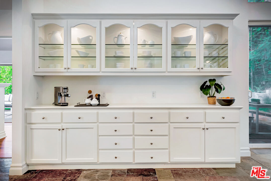 16561 Adlon Road Encino, CA 91436 - Photo 21 of 75 a view of white cabinet with white walls