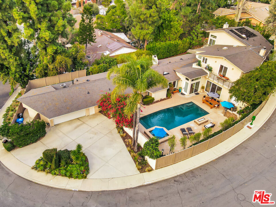 16561 Adlon Road Encino, CA 91436 - Photo 74 of 75 an aerial view of a house with a swimming pool