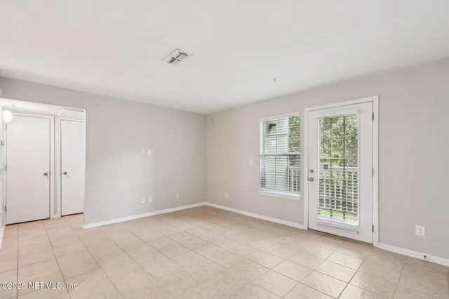 a kitchen with a stove sink and refrigerator