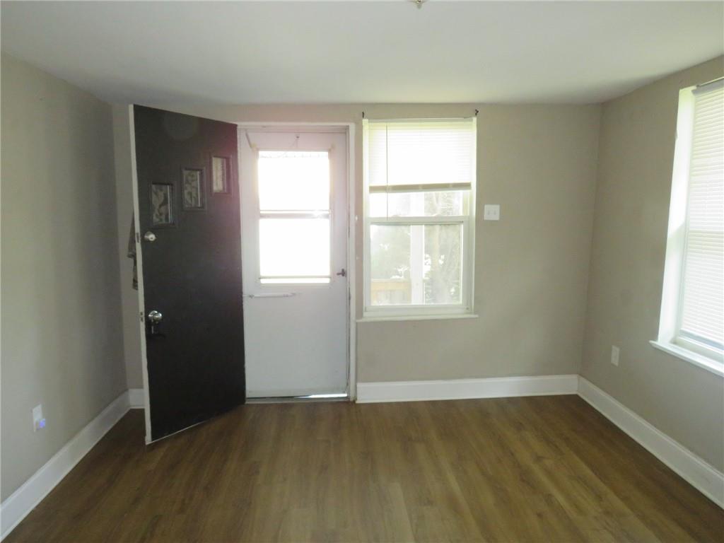 680 Hamilton Monroeville, PA 15146 - Photo 2 of 18 an empty room with wooden floor and windows