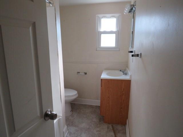 680 Hamilton Monroeville, PA 15146 - Photo 4 of 18 a bathroom with a toilet and a sink