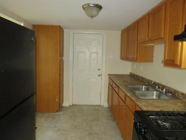 680 Hamilton Monroeville, PA 15146 - Photo 8 of 18 a kitchen with granite countertop a sink a stove and a refrigerator