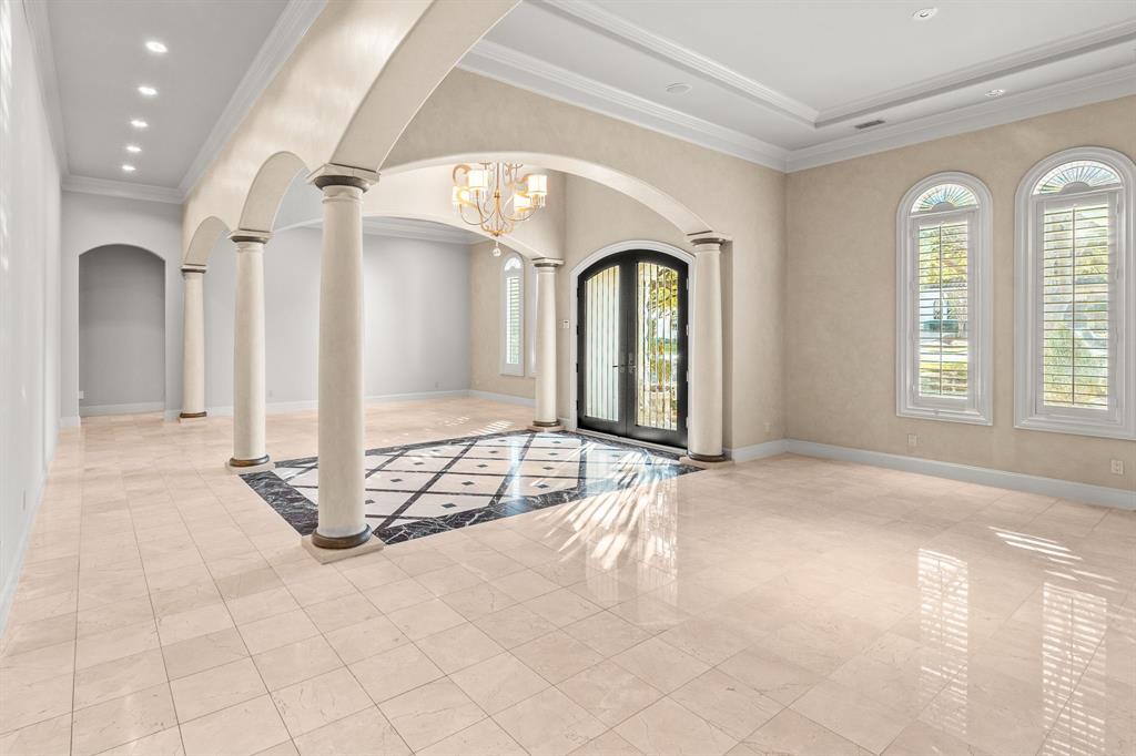 4624 Byron Circle Irving, TX 75038 - Photo 12 of 39 a view of a room with a chandelier