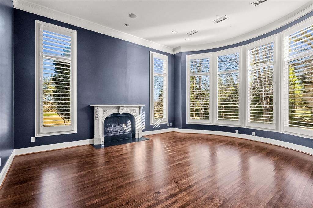 4624 Byron Circle Irving, TX 75038 - Photo 25 of 39 a view of an empty room with a window and fire place