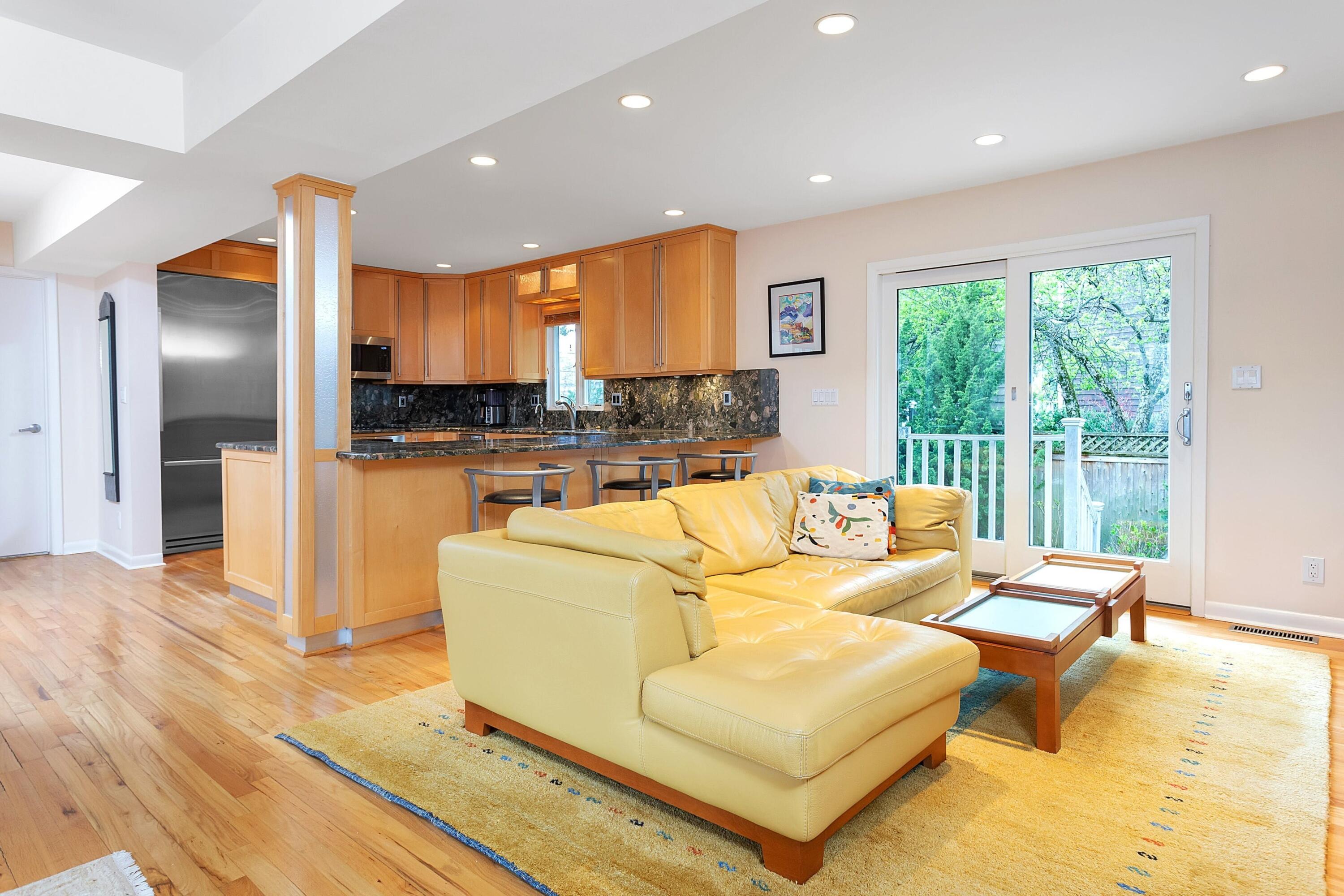 90 Roton Avenue Norwalk, CT 06853 - Photo 13 of 33 a living room with furniture and a large window