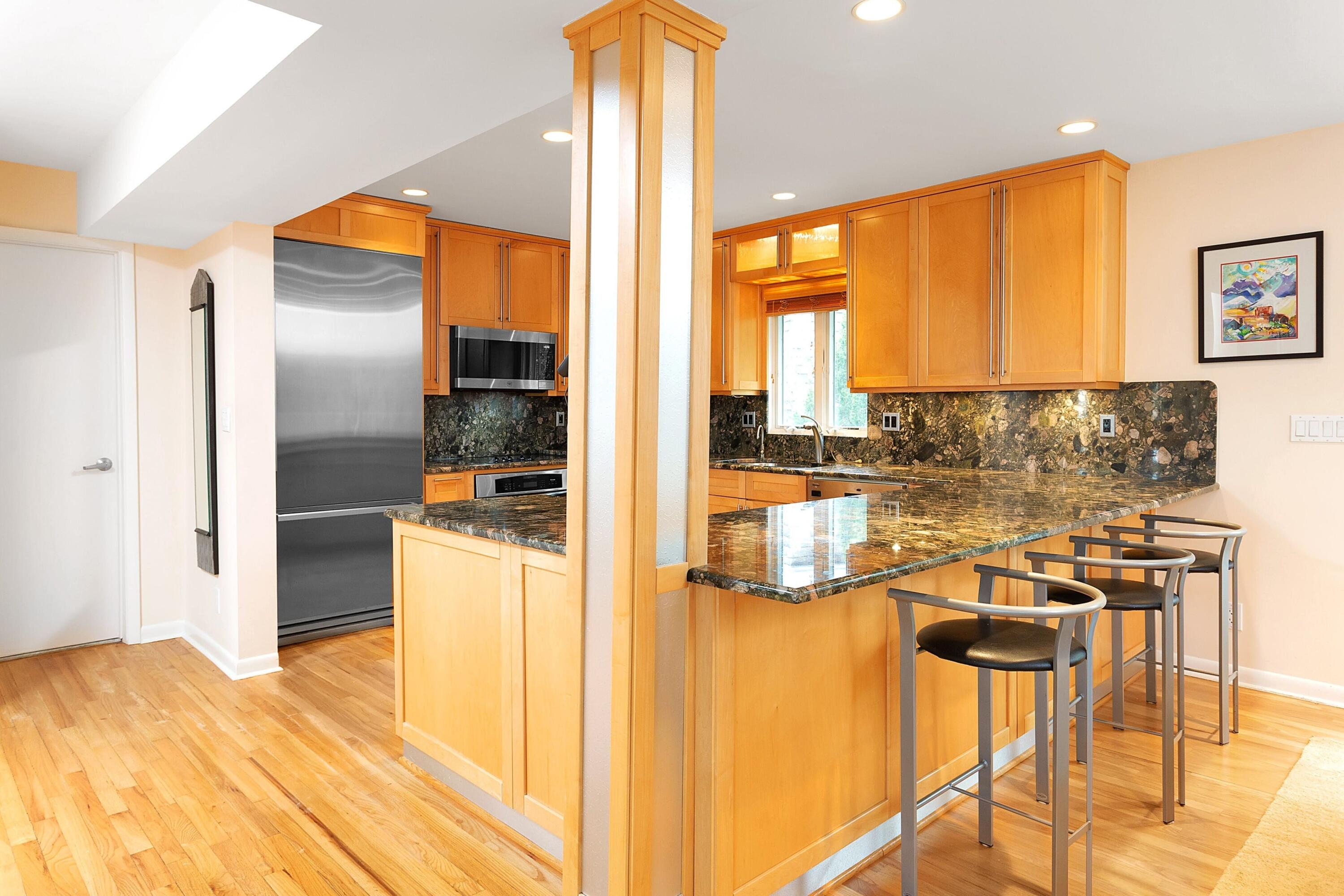 90 Roton Avenue Norwalk, CT 06853 - Photo 14 of 33 a kitchen with a window and refrigerator