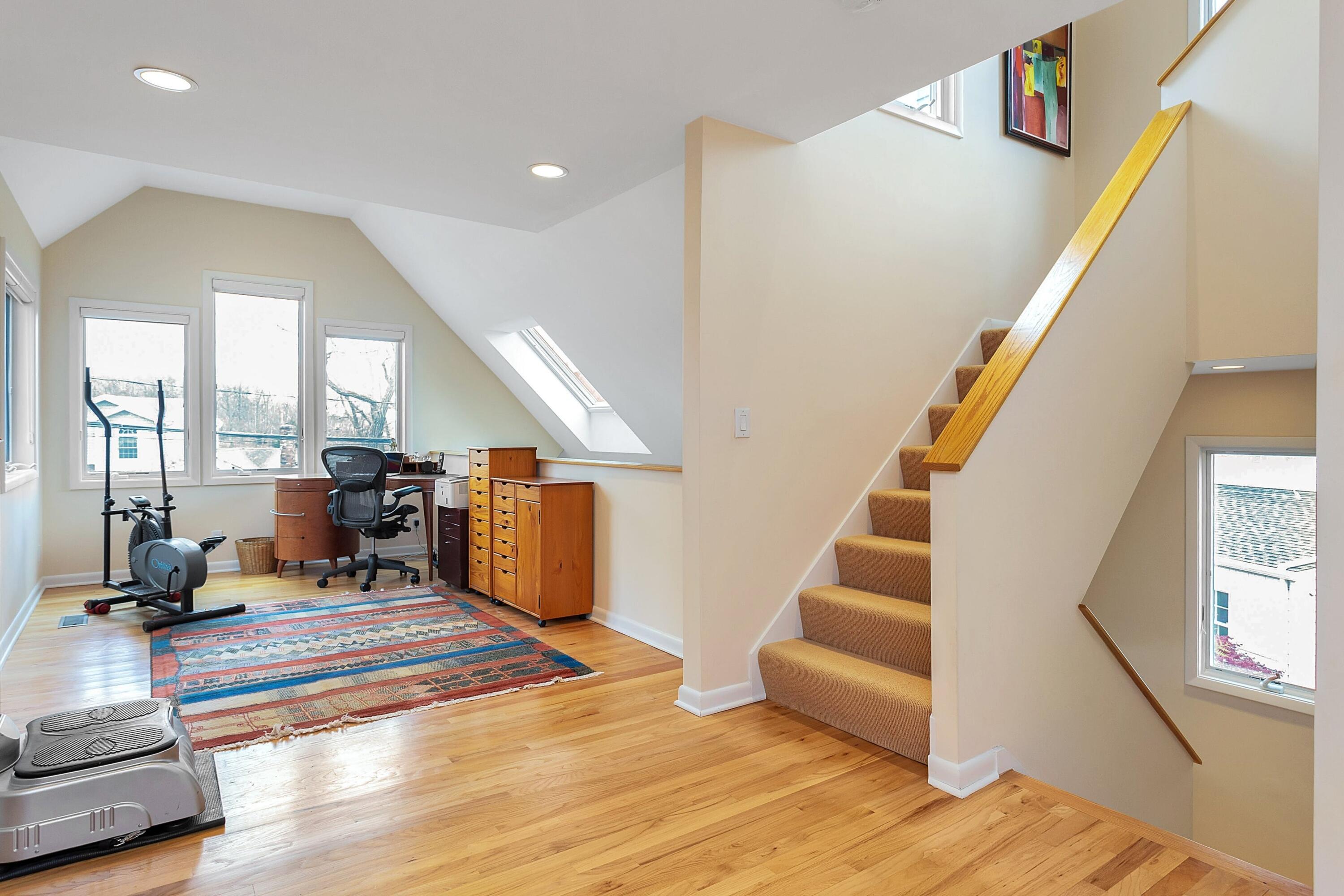 90 Roton Avenue Norwalk, CT 06853 - Photo 16 of 33 a living room with furniture and a floor to ceiling window
