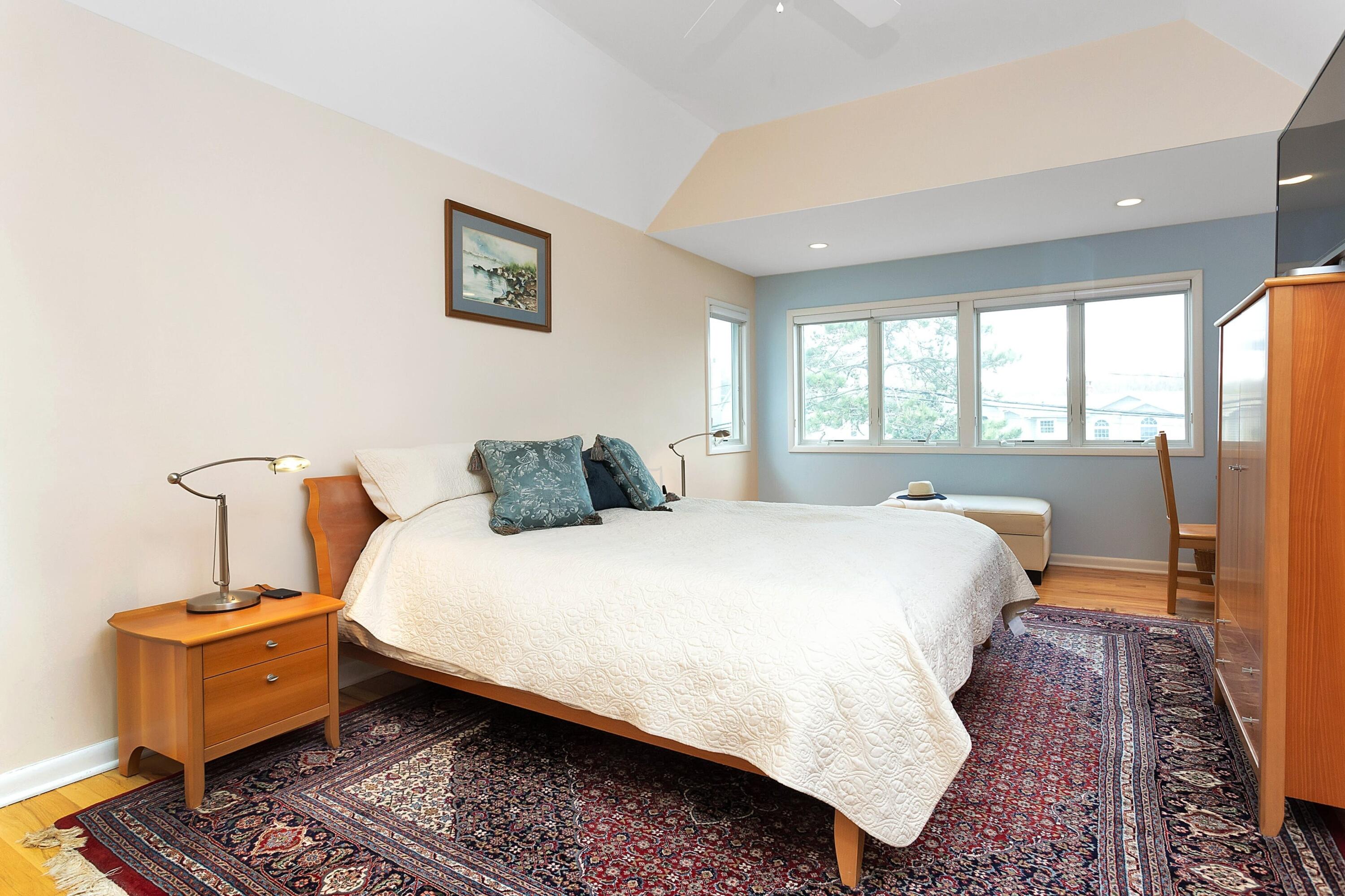 90 Roton Avenue Norwalk, CT 06853 - Photo 18 of 33 a bedroom with bed and window