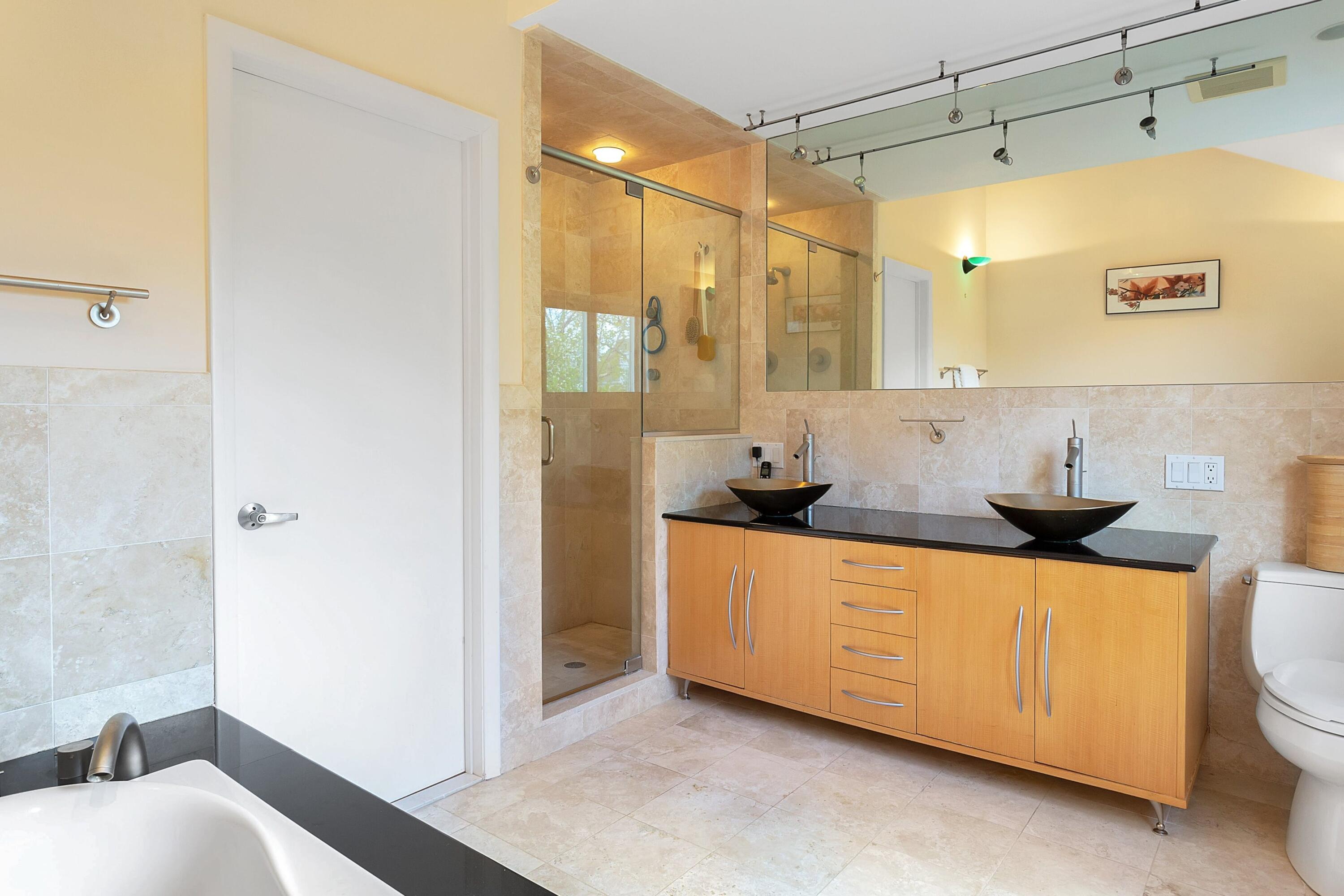 90 Roton Avenue Norwalk, CT 06853 - Photo 20 of 33 a bathroom with a sink a double vanity and shower