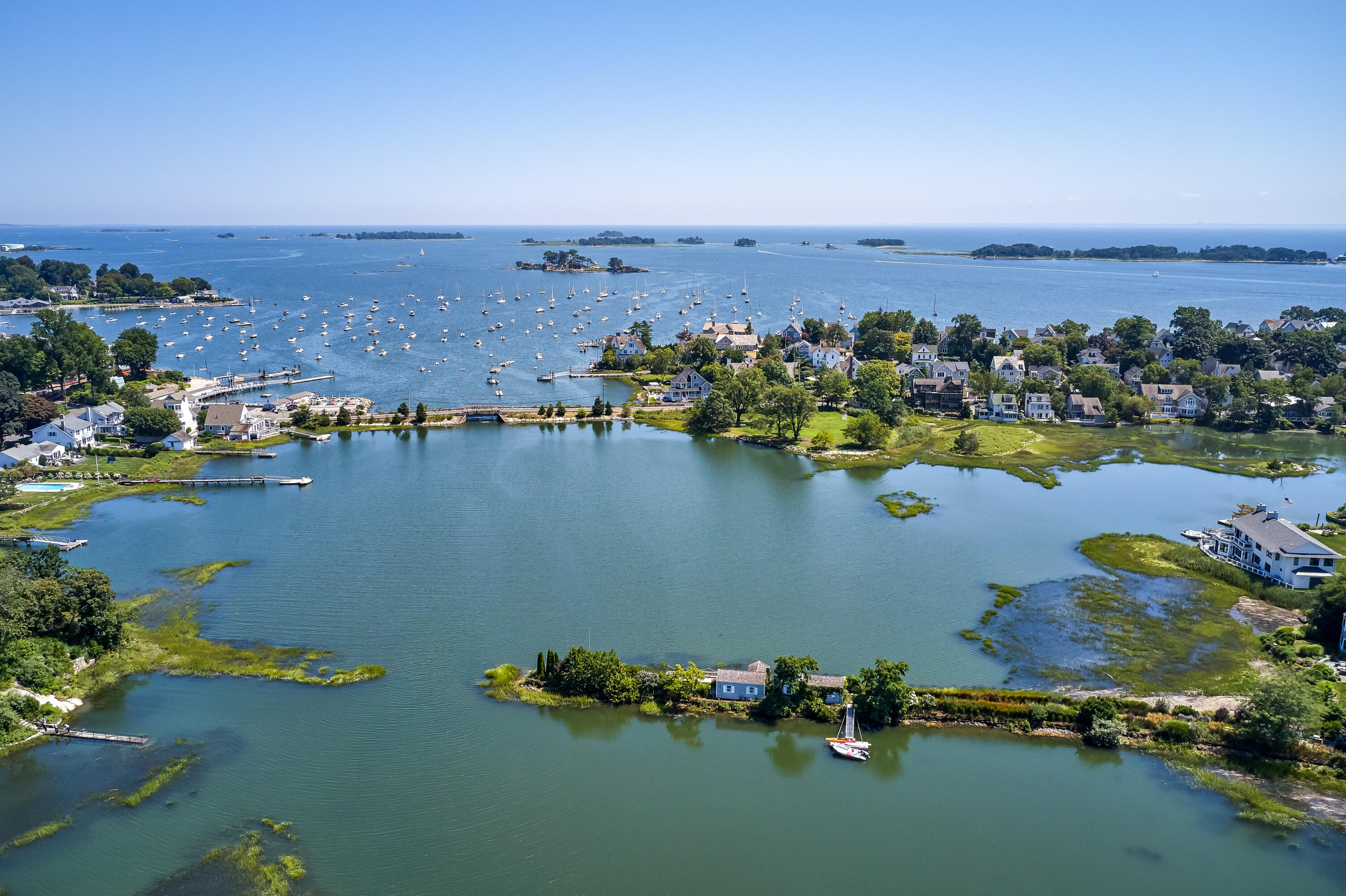 90 Roton Avenue Norwalk, CT 06853 - Photo 2 of 33 an aerial view of a houses with ocean view