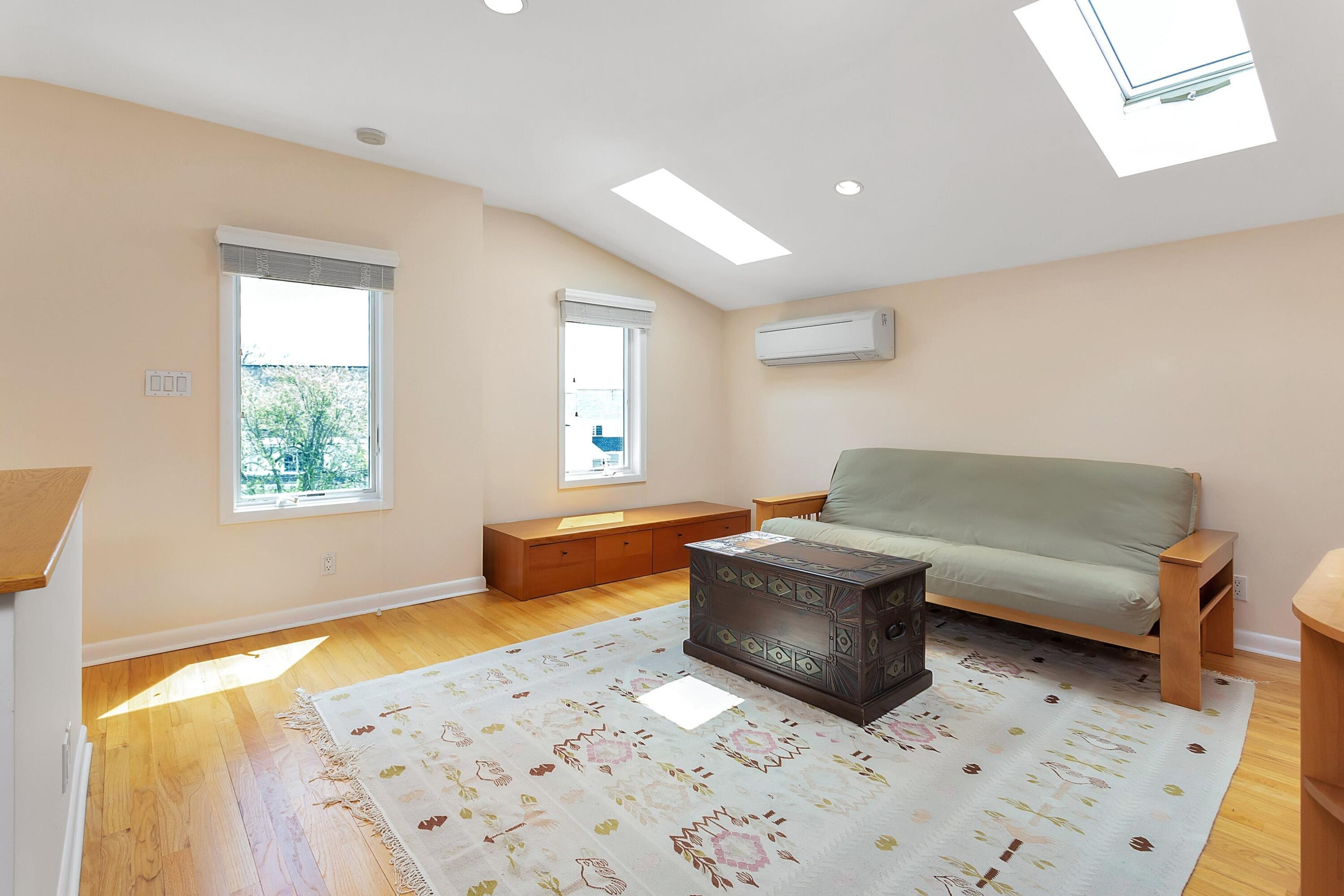 90 Roton Avenue Norwalk, CT 06853 - Photo 23 of 33 a living room with furniture and a window