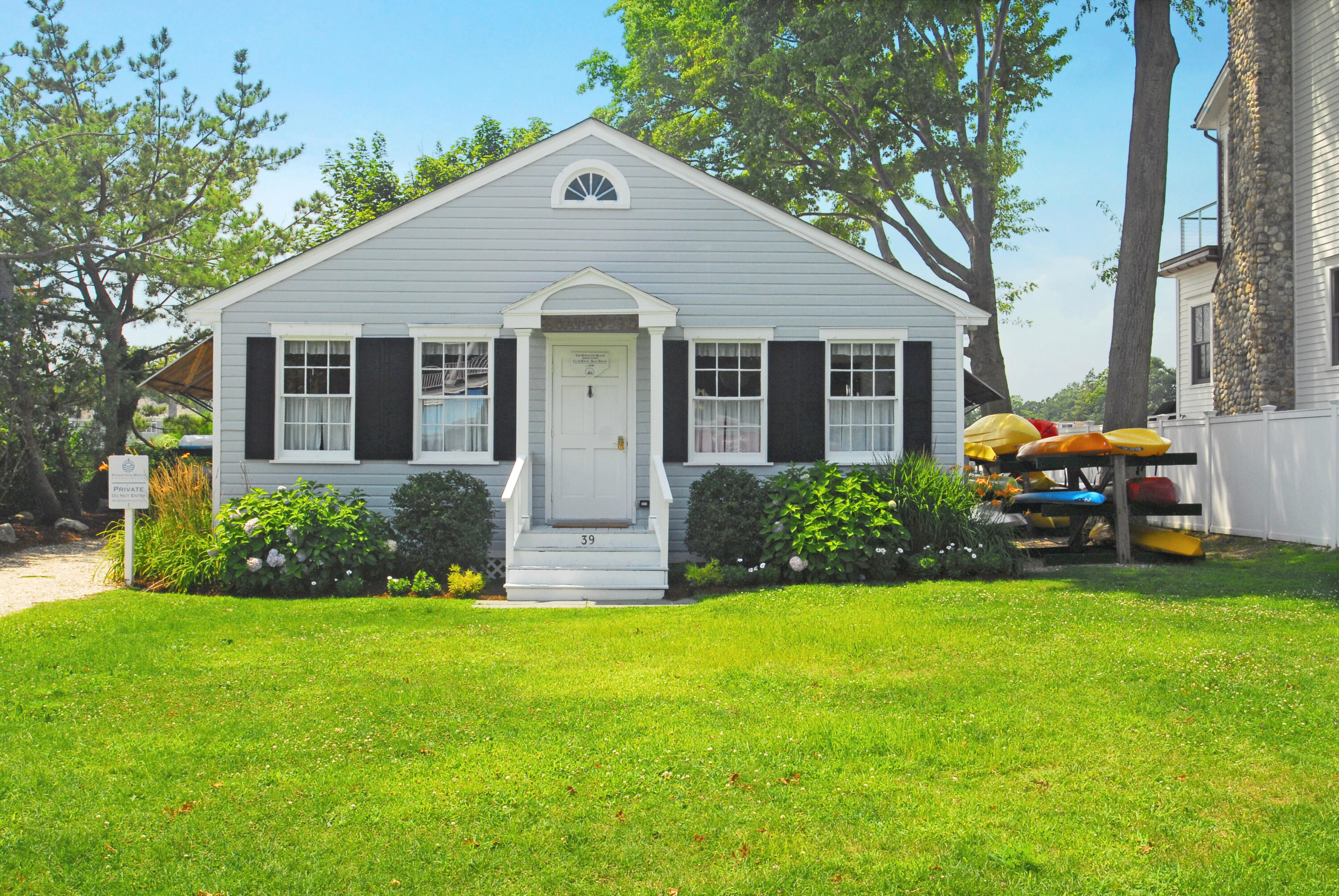 90 Roton Avenue Norwalk, CT 06853 - Photo 28 of 33 a front view of house with yard and green space