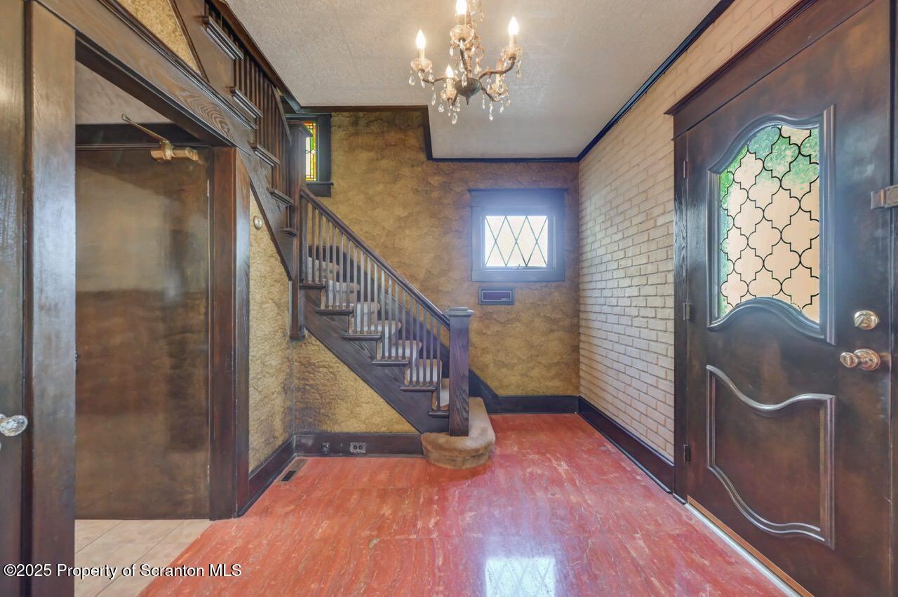 624 Main Street Moosic, PA 18507 - Photo 15 of 78 a view of entryway and hall with wooden floor
