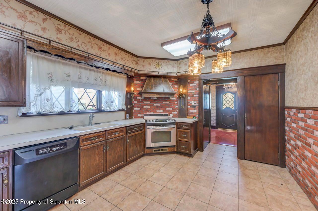 624 Main Street Moosic, PA 18507 - Photo 24 of 78 a large kitchen with cabinets and stainless steel appliances