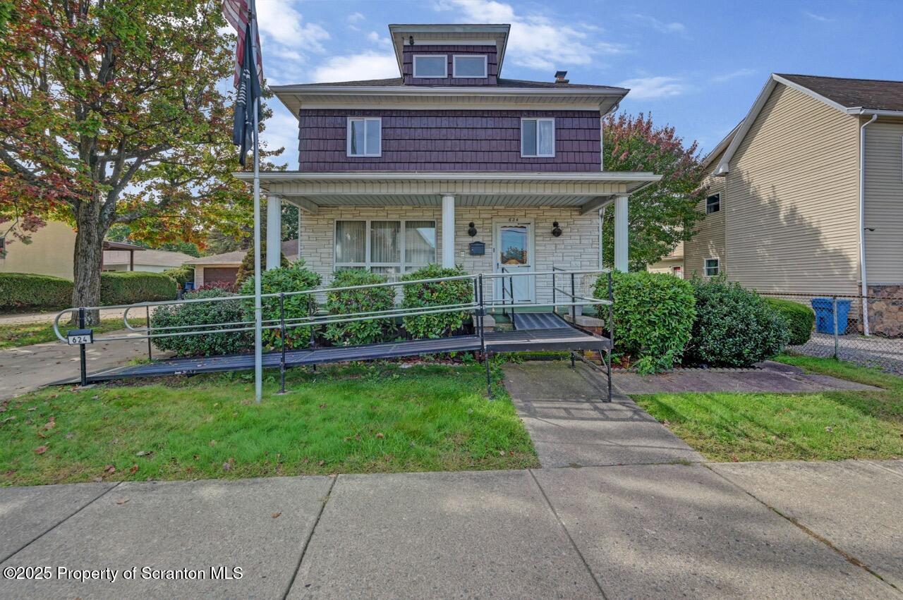 624 Main Street Moosic, PA 18507 - Photo 4 of 78 a front view of a house with a yard