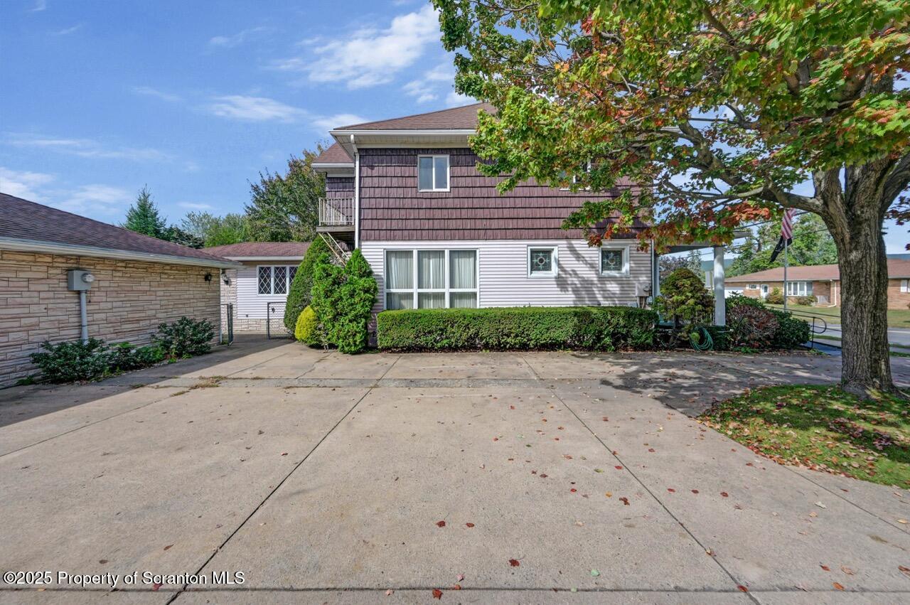 624 Main Street Moosic, PA 18507 - Photo 72 of 78 front view of a house with a street
