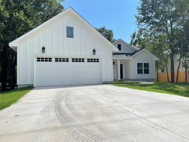 a view of backyard of house garage