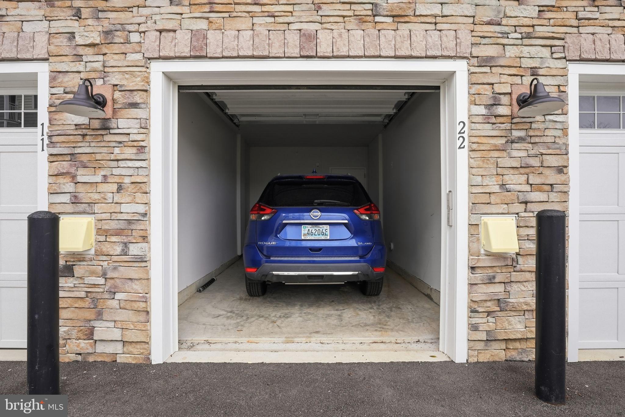 111 Marshgrass Way, Unit 22 Chester, MD 21619 - Photo 33 of 102 a front view of a house with a parking space