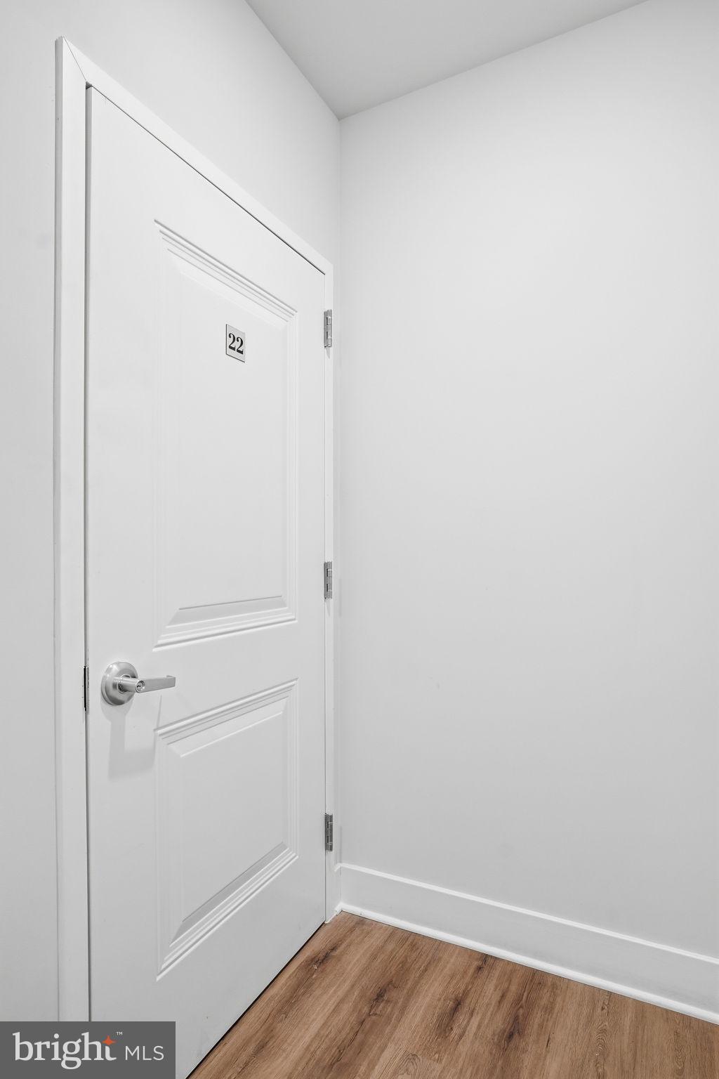 111 Marshgrass Way, Unit 22 Chester, MD 21619 - Photo 35 of 102 a view of small space with wooden floor