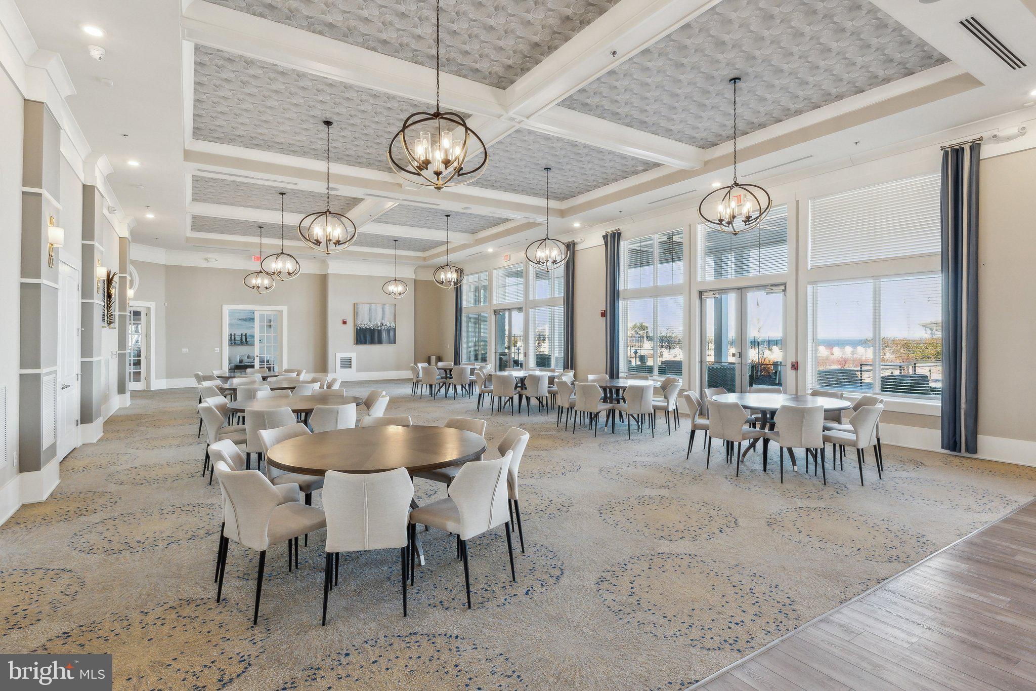 111 Marshgrass Way, Unit 22 Chester, MD 21619 - Photo 41 of 102 a view of a dining room with furniture window and outside view