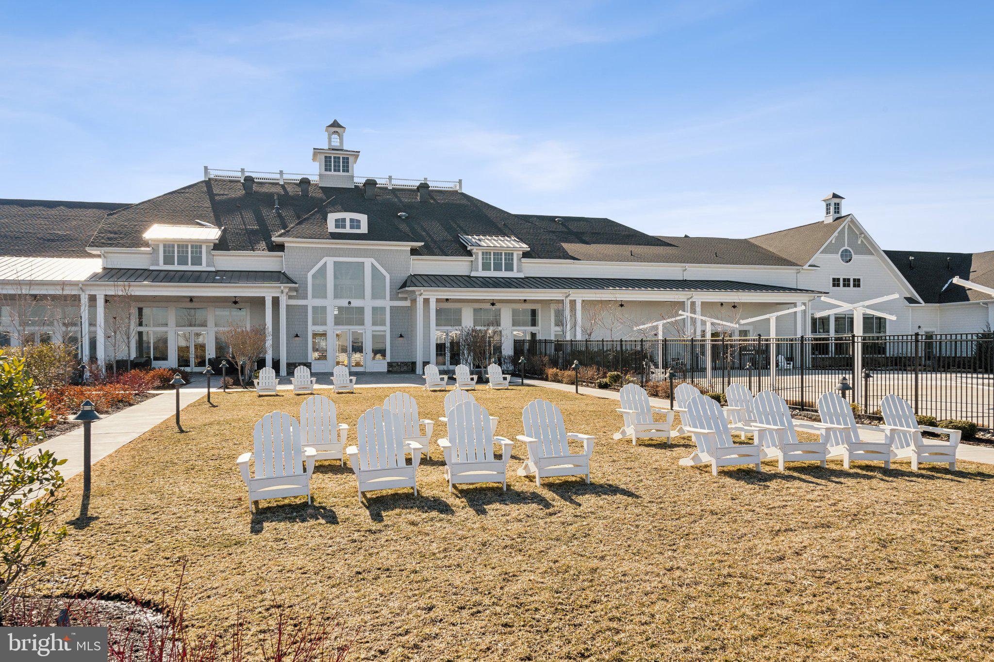 111 Marshgrass Way, Unit 22 Chester, MD 21619 - Photo 63 of 102 a view of a house with swimming pool and sitting area