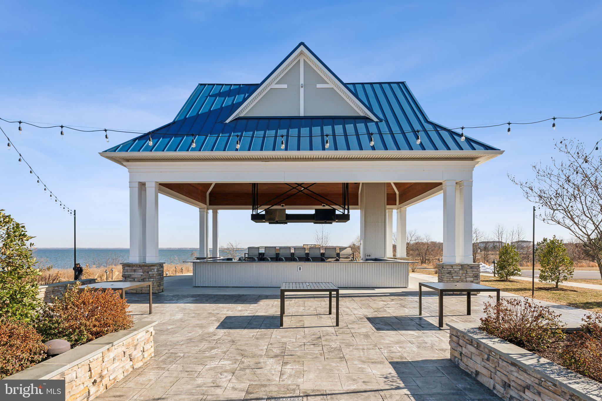 111 Marshgrass Way, Unit 22 Chester, MD 21619 - Photo 72 of 102 a front view of a house with a yard