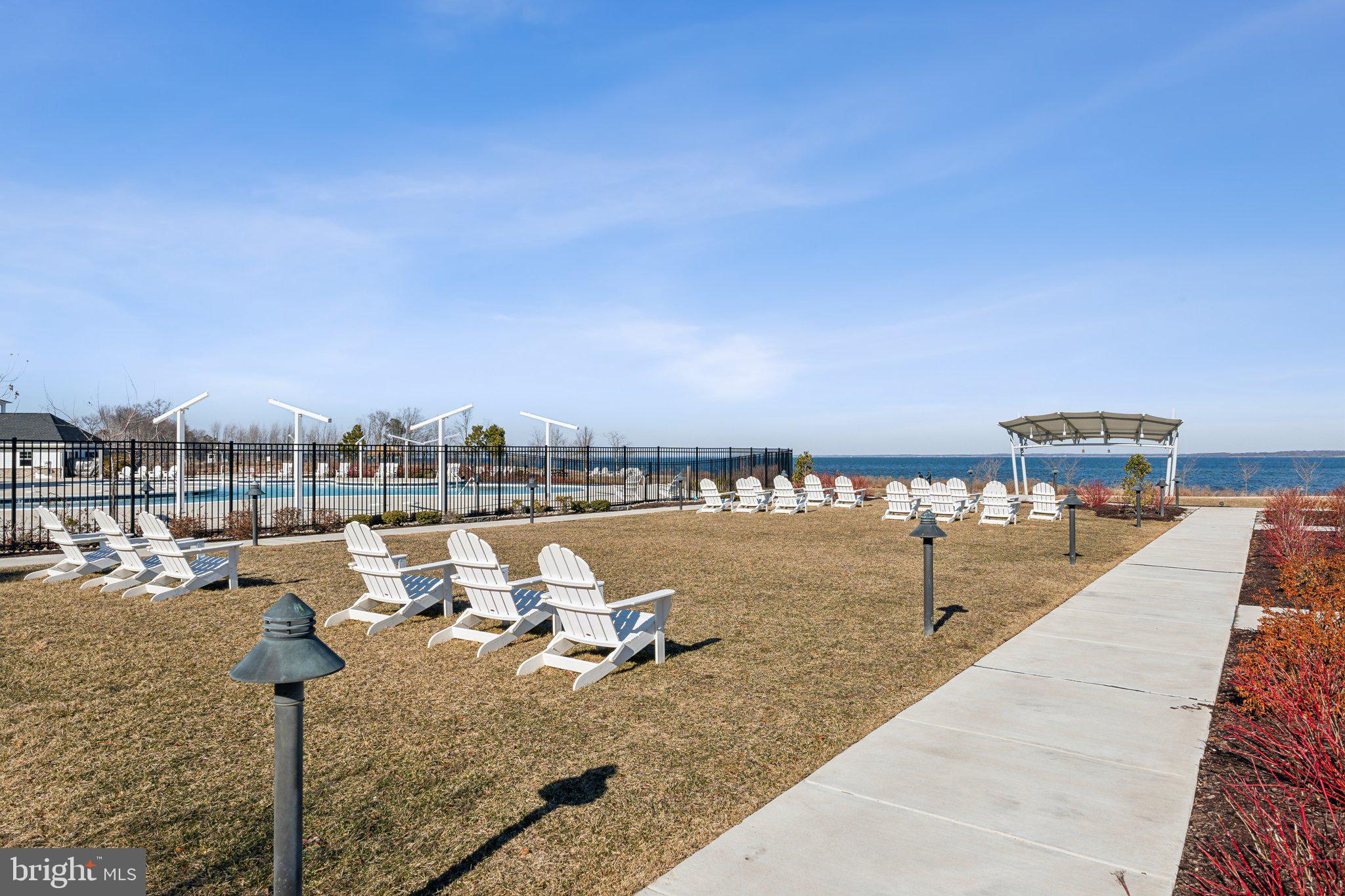 111 Marshgrass Way, Unit 22 Chester, MD 21619 - Photo 76 of 102 a view of a lake with outdoor space