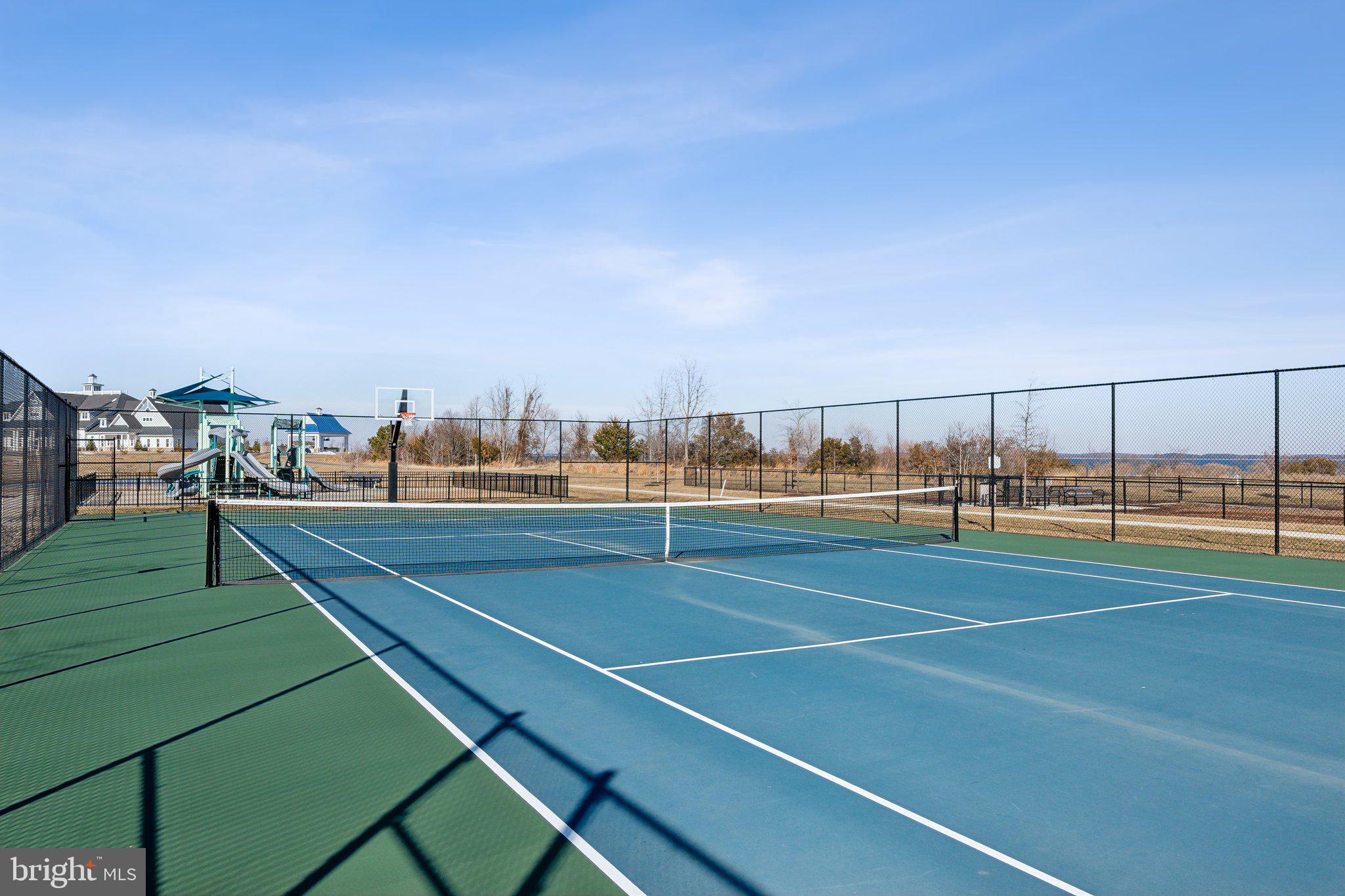 111 Marshgrass Way, Unit 22 Chester, MD 21619 - Photo 86 of 102 a view of a tennis court