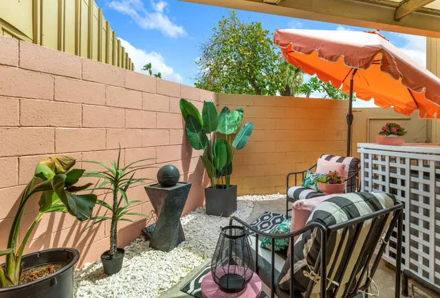 a view of balcony with a potted plant