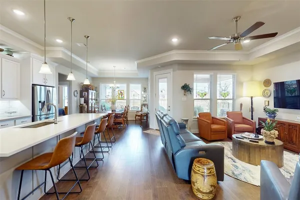 a large living room with furniture