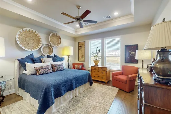 a bedroom with bed and a window