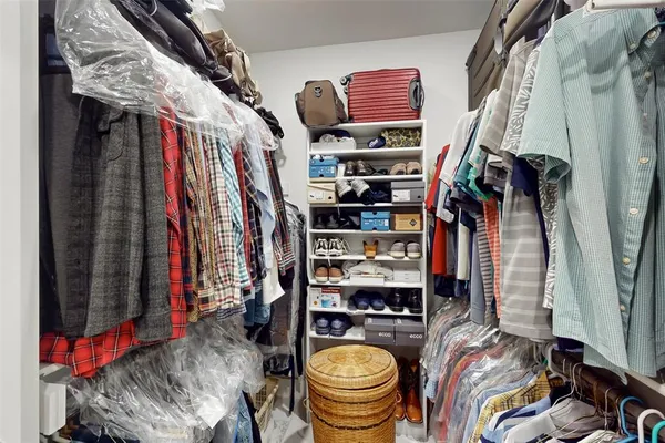 a view of cabinets and wooden floor