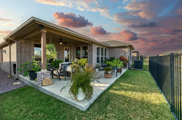 a garden view with a seating space