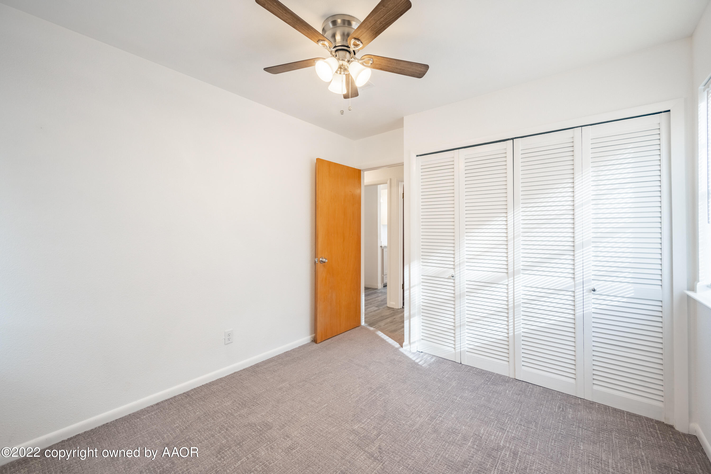 5311 Allen Street Amarillo, TX 79110 - Photo 16 of 22 a view of an empty room with a window