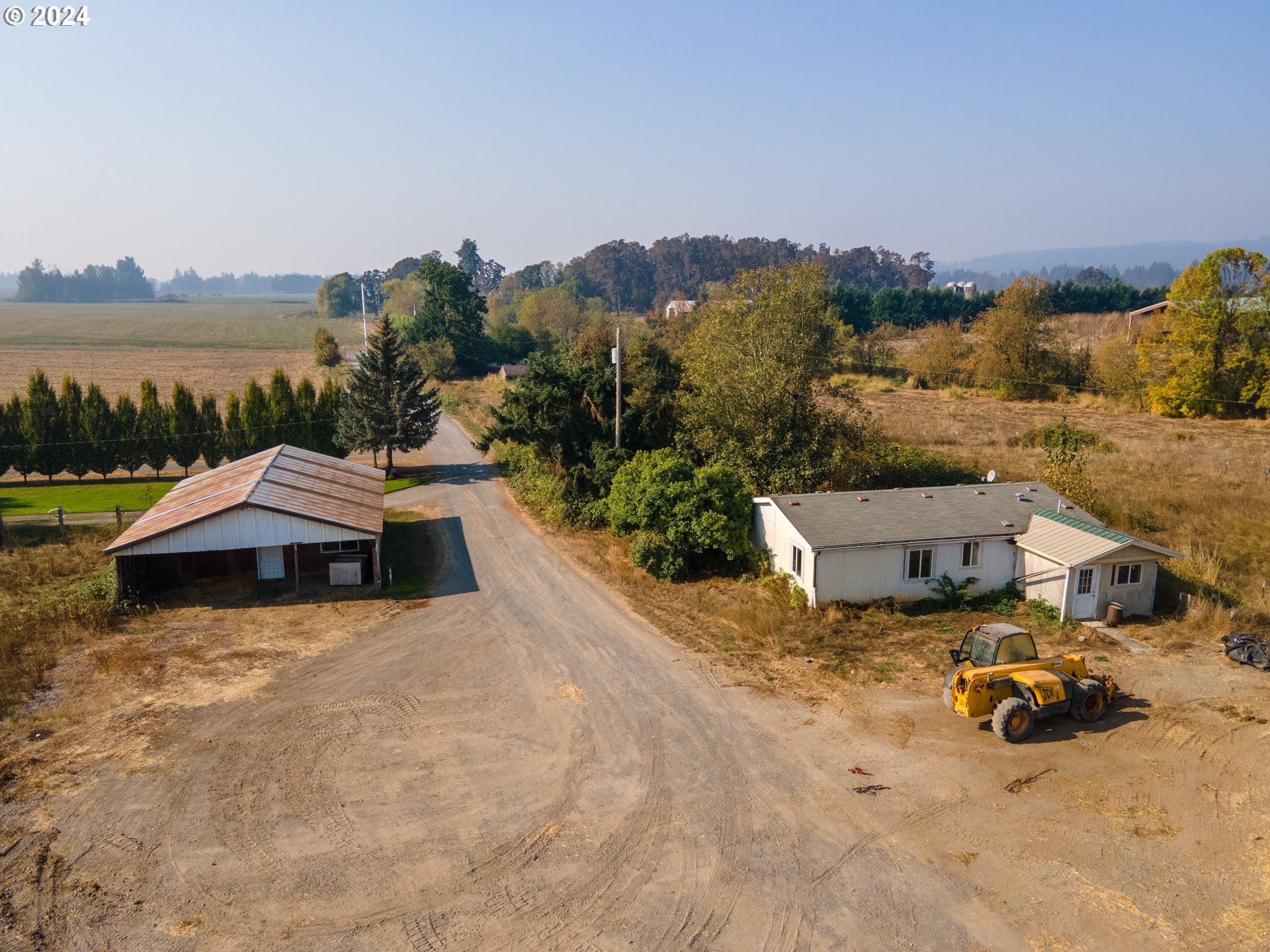 22892 Schultz Road Northeast Aurora, OR 97002 - Photo 11 of 42 a view of a lake with a mountain