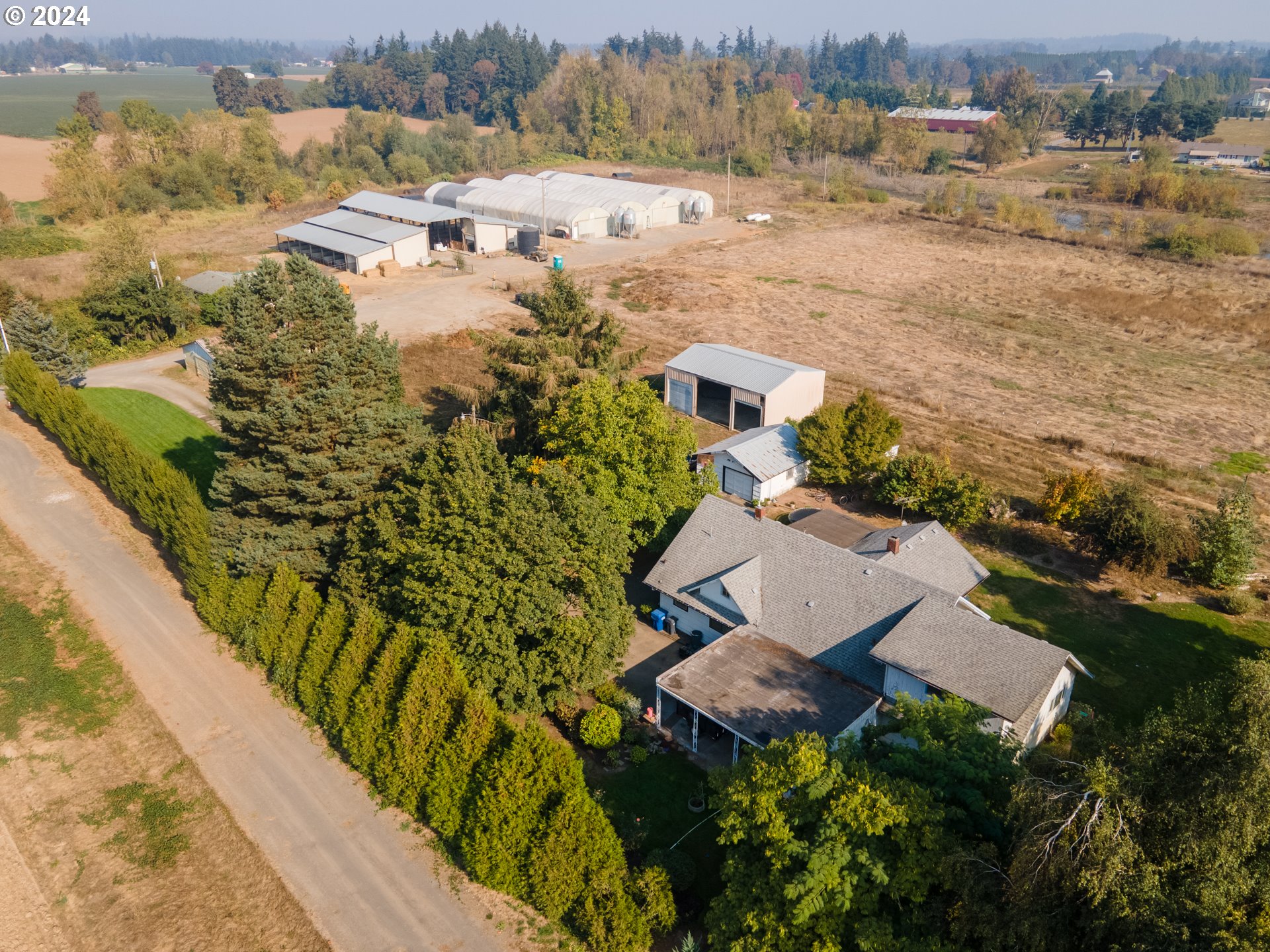 22892 Schultz Road Northeast Aurora, OR 97002 - Photo 12 of 42 an aerial view of residential houses with outdoor space