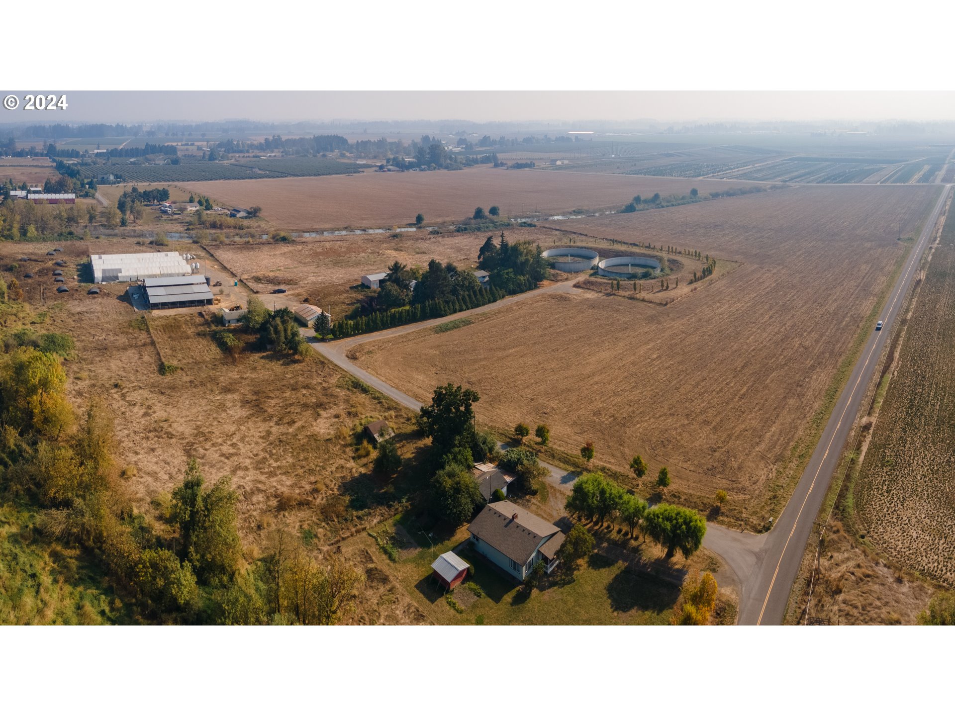 22892 Schultz Road Northeast Aurora, OR 97002 - Photo 16 of 42 an aerial view of multiple house