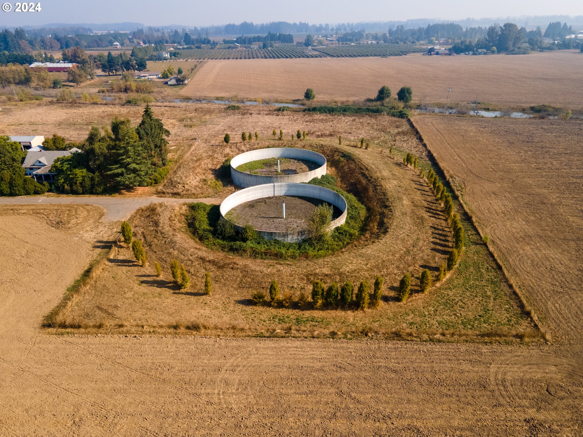 22892 Schultz Road Northeast Aurora, OR 97002 - Photo 18 of 42 an aerial view of a house with outdoor space and lake view
