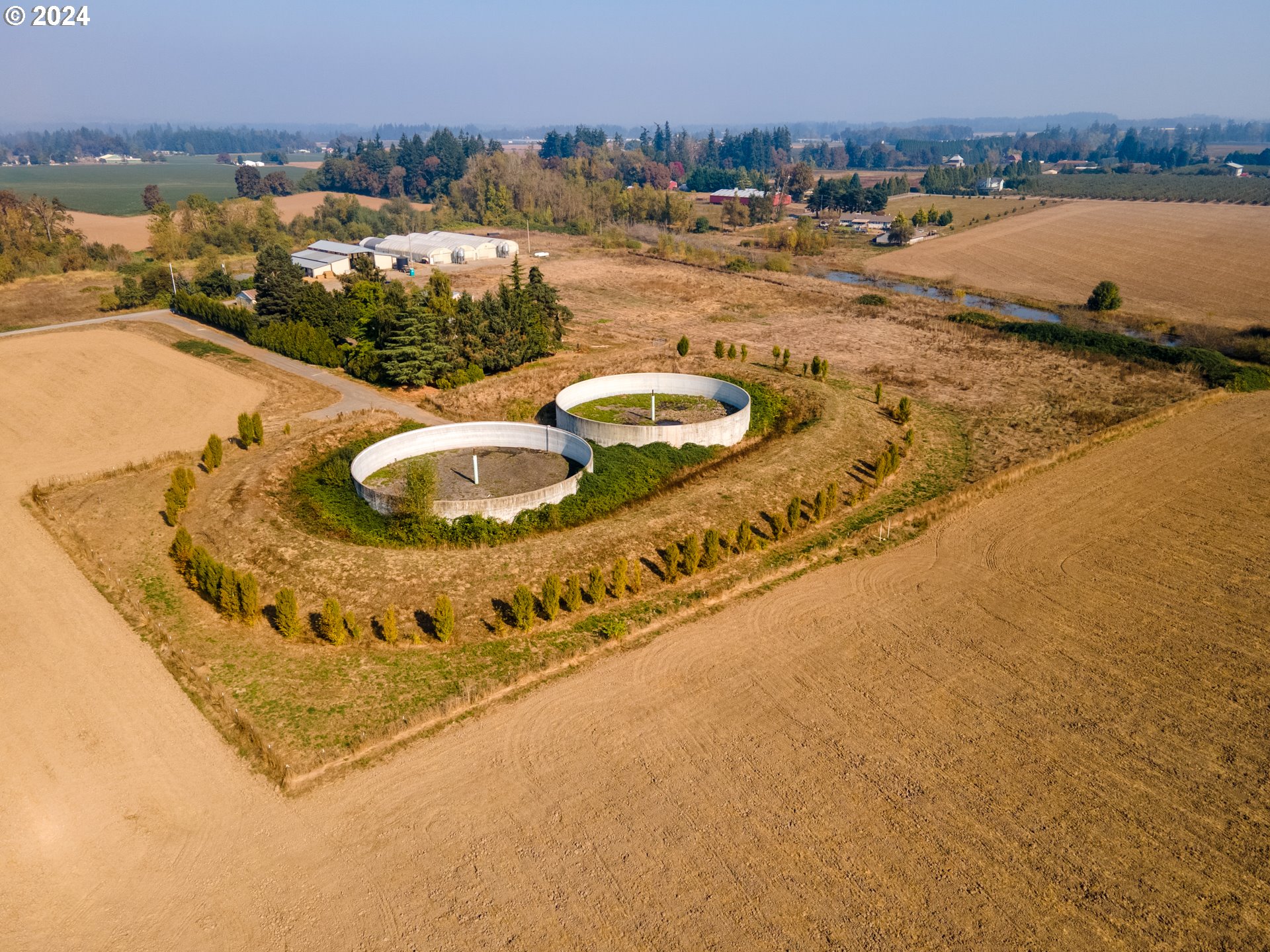 22892 Schultz Road Northeast Aurora, OR 97002 - Photo 19 of 42 a view of a swimming pool and an ocean view