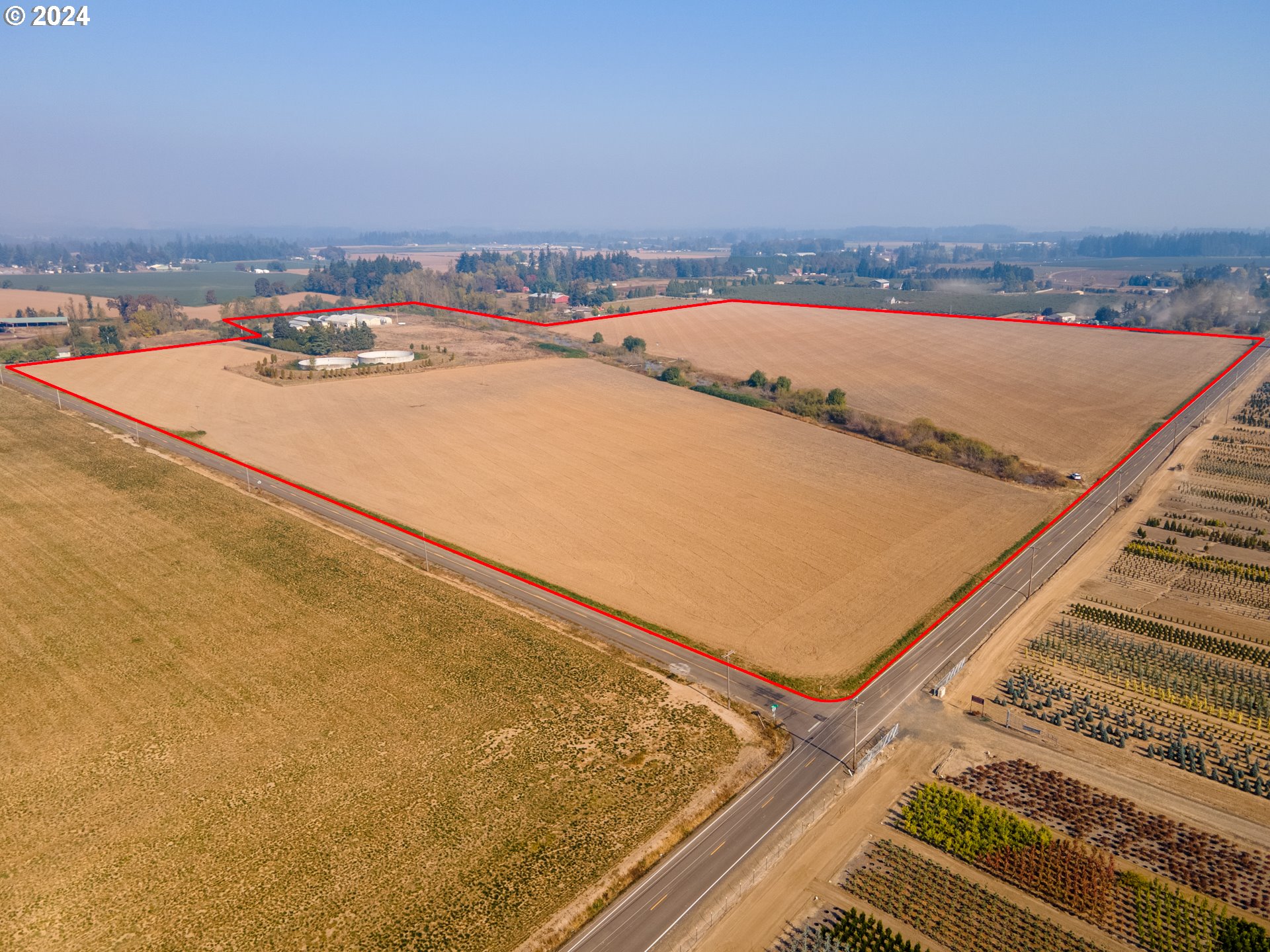 22892 Schultz Road Northeast Aurora, OR 97002 - Photo 22 of 42 an aerial view of a house