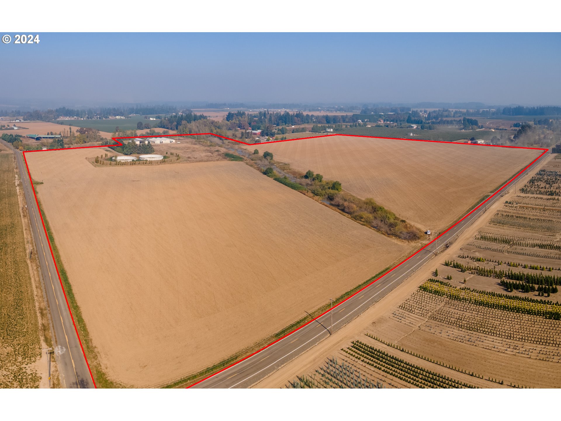 22892 Schultz Road Northeast Aurora, OR 97002 - Photo 26 of 42 a view of an ocean and beach