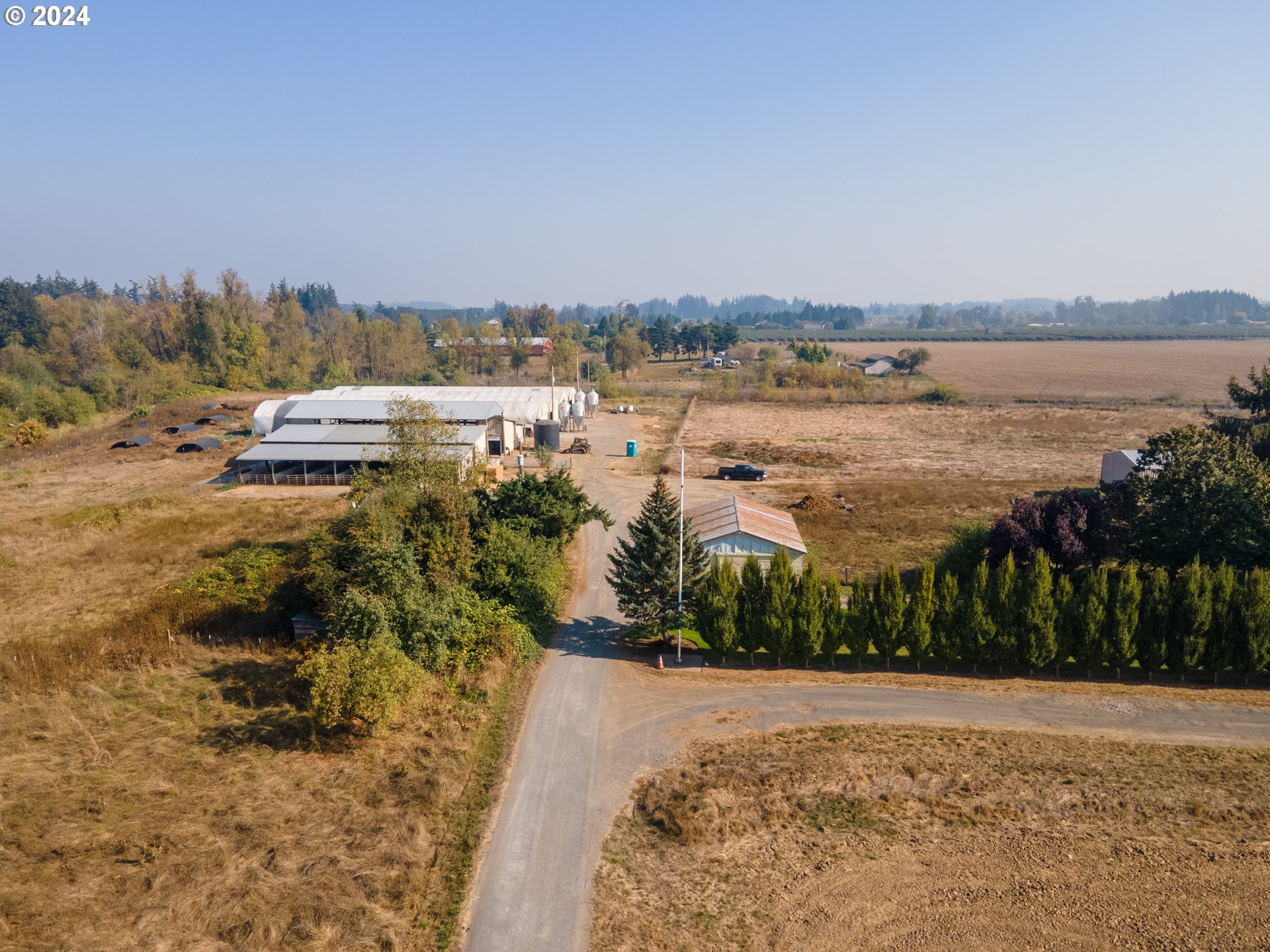 22892 Schultz Road Northeast Aurora, OR 97002 - Photo 34 of 42 a view of a lake with a city