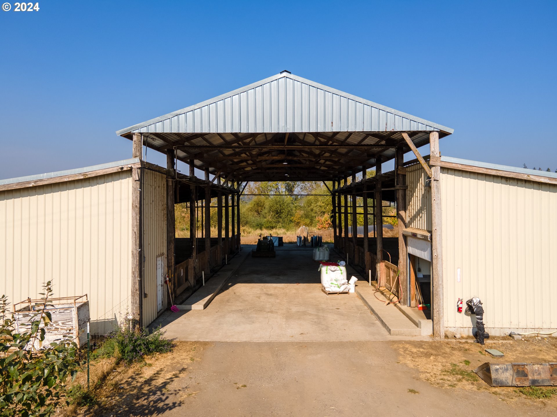 22892 Schultz Road Northeast Aurora, OR 97002 - Photo 36 of 42 a front view of a house with a porch