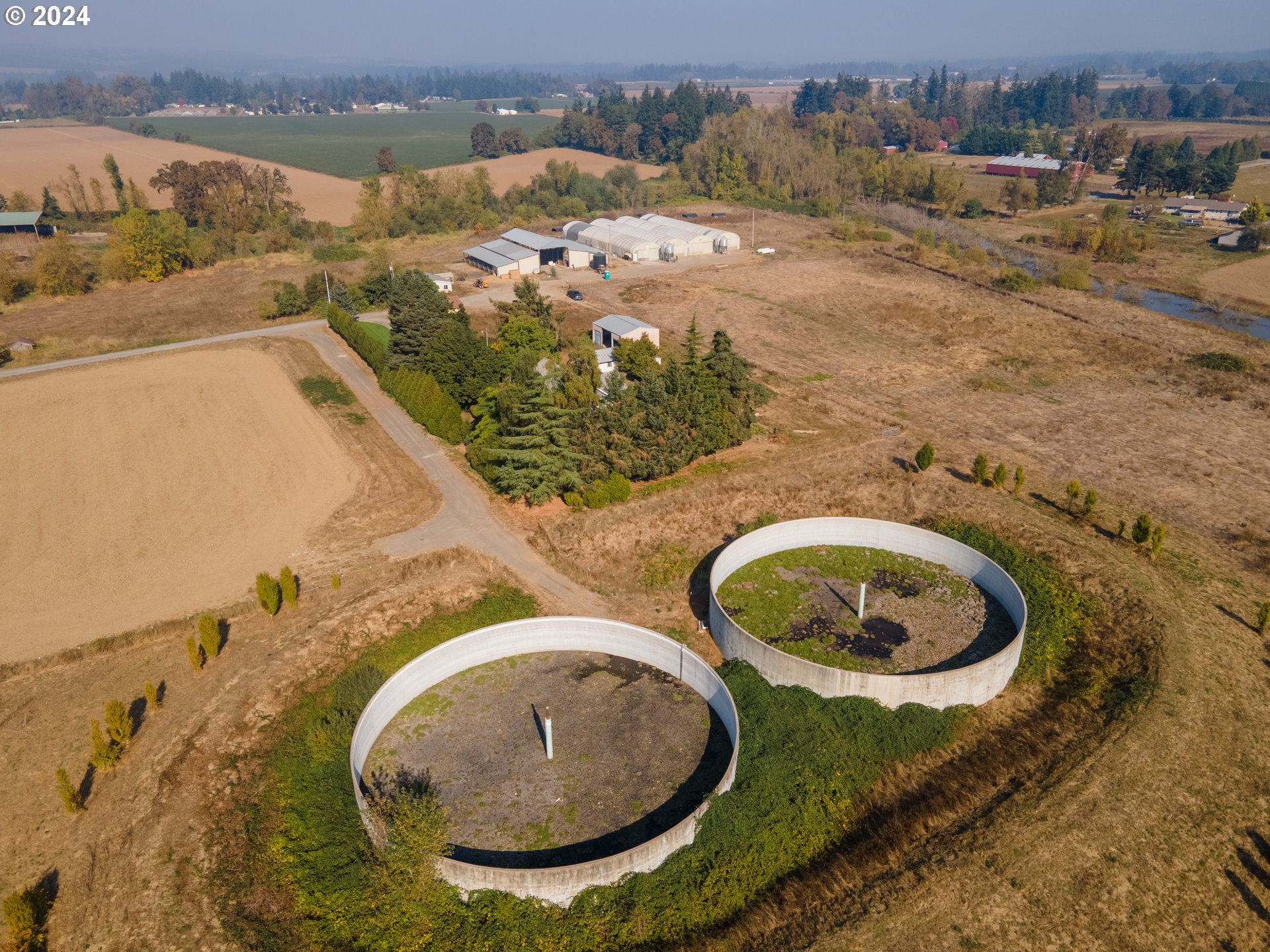 22892 Schultz Road Northeast Aurora, OR 97002 - Photo 42 of 42 an aerial view of a house with swimming pool and ocean view